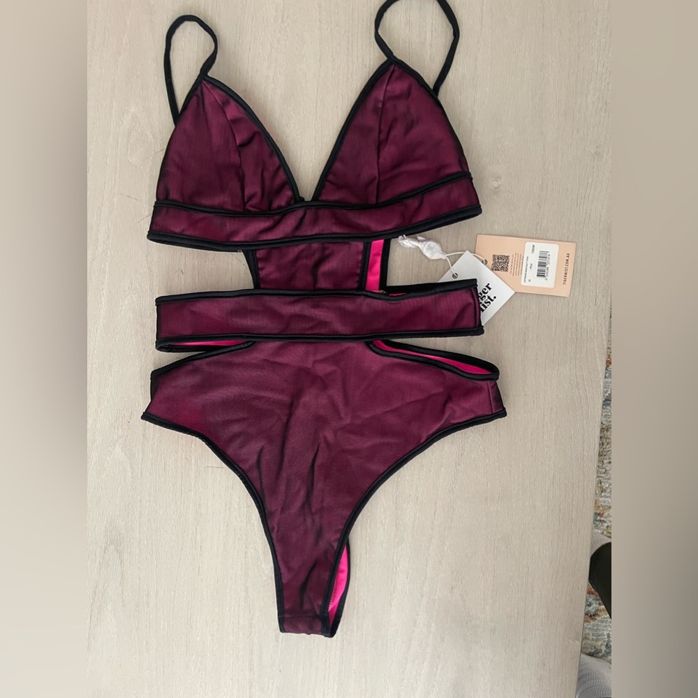 Bright pink bodysuit